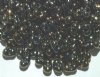 25 grams of 3x7mm Metallic Bronze AB Farfalle Seed Beads